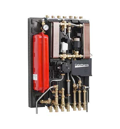 Small
  black heat interface unit with loads of pipes down the bottom and a small
  fire extinguisher to the left